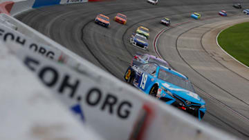 HAMPTON, GEORGIA - JUNE 07: Martin Truex Jr., driver of the #19 Auto Owners Insurance Toyota, leads a pack of cars during the NASCAR Cup Series Folds of Honor QuikTrip 500 at Atlanta Motor Speedway on June 07, 2020 in Hampton, Georgia. (Photo by Kevin C. Cox/Getty Images)