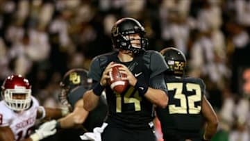 Nov 7, 2013; Waco, TX, USA; Baylor Bears quarterback Bryce Petty (14) throws a pass in the game against the Oklahoma Sooners at Floyd Casey Stadium. Baylor beat Oklahoma 41-12. Mandatory Credit: Tim Heitman-USA TODAY Sports