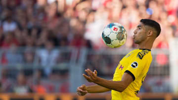 DORTMUND, GERMANY - SEPTEMBER 14: Achraf Hakimi of Borussia Dortmund controls the ball during the Bundesliga match between Borussia Dortmund and Bayer 04 Leverkusen at Signal Iduna Park on September 14, 2019 in Dortmund, Germany. (Photo by TF-Images/ Getty Images)