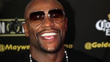 Jul 14, 2014; New York, NY, USA; Floyd Mayweather Jr. reacts during press conference at Times Square. Mandatory Credit: Noah K. Murray-USA TODAY Sports