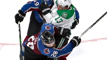 EDMONTON, ALBERTA - AUGUST 31: Mattias Janmark #13 of the Dallas Stars is checked by Ian Cole #28 of the Colorado Avalanche during the third period in Game Five of the Western Conference Second Round during the 2020 NHL Stanley Cup Playoffs at Rogers Place on August 31, 2020 in Edmonton, Alberta, Canada. (Photo by Bruce Bennett/Getty Images)