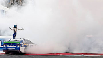 CHARLOTTE, NORTH CAROLINA - SEPTEMBER 29: Chase Elliott, driver of the #9 NAPA Auto Parts Chevrolet, celebrates after winning the Monster Energy NASCAR Cup Series Bank of America ROVAL 400 at Charlotte Motor Speedway on September 29, 2019 in Charlotte, North Carolina. (Photo by Brian Lawdermilk/Getty Images)