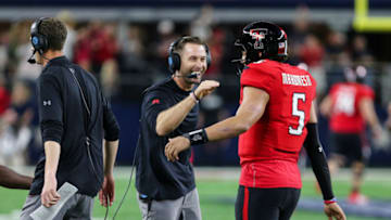 ARLINGTON, TX - NOVEMBER 25: Texas Tech Red Raiders head coach Kliff Kingsbury congratulates Texas Tech Red Raiders quarterback Patrick Mahomes II (5) after a touchdown during the Texas Farm Bureau Insurance Shootout between the Texas Tech Red Raiders and the Baylor Bears on November 25. 2016 at AT&T Stadium in Arlington, TX. Texas Tech beats Baylor 54-35. (Photo by Matthew Pearce/Icon Sportswire via Getty Images)