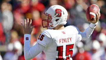 Oct 22, 2016; Louisville, KY, USA; North Carolina State Wolfpack quarterback Ryan Finley (15) looks to pass against the Louisville Cardinals during the second quarter at Papa John