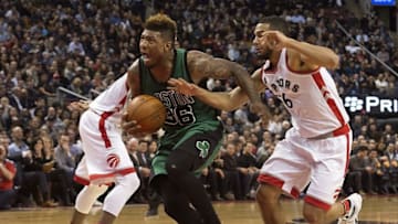 Jan 20, 2016; Toronto, Ontario, CAN; Boston Celtics guard Marcus Smart (36) drives to the basket as Toronto Raptors guard Cory Joseph (6) tries to defend during the fourth quarter in a game at Air Canada Centre. The Toronto Raptors won 115-109. Mandatory Credit: Nick Turchiaro-USA TODAY Sports