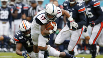 Auburn footballNov 23, 2019; Auburn, AL, USA; Samford Bulldogs running back Devan Walker (17) is tackled by Auburn Tigers defensive back Zion Puckett (11) during the third quarter at Jordan-Hare Stadium. Mandatory Credit: John Reed-USA TODAY Sports