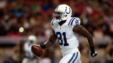 Aug 29, 2015; St. Louis, MO, USA; Indianapolis Colts wide receiver Andre Johnson (81) scores a touchdown during the first quarter of a football game against the St. Louis Rams at the Edward Jones Dome. Mandatory Credit: Scott Kane-USA TODAY Sports