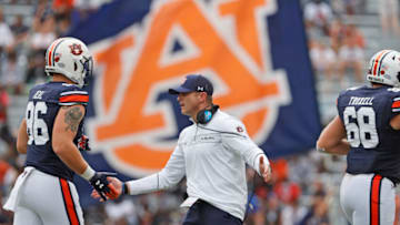 Auburn footballSep 11, 2021; Auburn, Alabama, USA; Auburn Tigers head coach Bryan Harsin congratulates his players during the third quarter at Jordan-Hare Stadium. Mandatory Credit: John Reed-USA TODAY Sports
