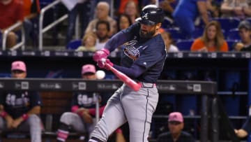 MIAMI, FL - MAY 13: Nick Markakis #22 of the Atlanta Braves bats for an rbi single in the first inning against the Miami Marlins at Marlins Park on May 13, 2018 in Miami, Florida. (Photo by Mark Brown/Getty Images)