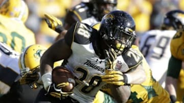 Jan 4, 2014; Frisco, TX, USA; Towson Tigers running back Terrance West (28) runs the ball against the North Dakota State Bison in the third quarter at Toyota Stadium. North Dakota State beat Towson 35-7. Mandatory Credit: Tim Heitman-USA TODAY Sports