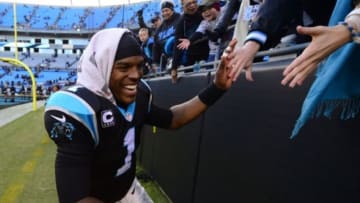 Dec 1, 2013; Charlotte, NC, USA; Carolina Panthers quarterback Cam Newton (1) reacts with fans after the game. The Carolina Panthers defeated the Tampa Bay Buccaneers 27-6 at Bank of America Stadium. Mandatory Credit: Bob Donnan-USA TODAY Sports