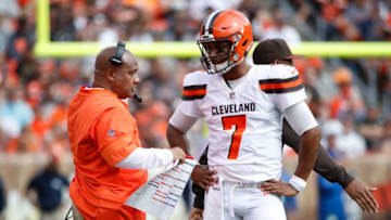 CLEVELAND, OH - OCTOBER 08: Head coach Hue Jackson talks with DeShone Kizer