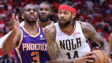 NEW ORLEANS, LOUISIANA - APRIL 24: Brandon Ingram #14 of the New Orleans Pelicans drives against Chris Paul #3 of the Phoenix Suns during the second half of Game Four of the Western Conference First Round at the Smoothie King Center on April 24, 2022 in New Orleans, Louisiana. NOTE TO USER: User expressly acknowledges and agrees that, by downloading and or using this Photograph, user is consenting to the terms and conditions of the Getty Images License Agreement. (Photo by Jonathan Bachman/Getty Images)