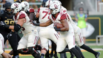 WACO, TX - SEPTEMBER 23: Oklahoma FB Dimitri Flowers (36) follows the blocking of Dru Samia (75) during game between the Oklahoma Sooners and the Baylor Bears on September 23, 2017 at McLane Stadium in Waco, TX. (Photo by John Rivera/Icon Sportswire via Getty Images)