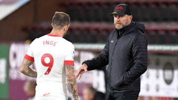 BURNLEY, ENGLAND - SEPTEMBER 26: Ralph Hasenhuttl, Manager of Southampton speaks to Danny Ings of Southampton during the Premier League match between Burnley and Southampton at Turf Moor on September 26, 2020 in Burnley, England. Sporting stadiums around the UK remain under strict restrictions due to the Coronavirus Pandemic as Government social distancing laws prohibit fans inside venues resulting in games being played behind closed doors. (Photo by Peter Powell - Pool/Getty Images)