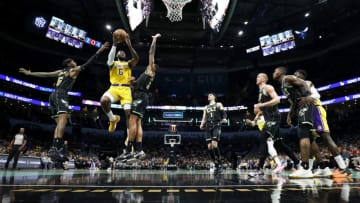 CHARLOTTE, NORTH CAROLINA - JANUARY 02: LeBron James #6 of the Los Angeles Lakers drives to the basket during the second half of the game against the Charlotte Hornets at Spectrum Center on January 02, 2023 in Charlotte, North Carolina. NOTE TO USER: User expressly acknowledges and agrees that, by downloading and or using this photograph, User is consenting to the terms and conditions of the Getty Images License Agreement. (Photo by Jared C. Tilton/Getty Images)