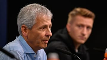 Dortmund's Swiss coach Lucien Favre and Dortmund's German forward Marco Reus are pictured during a press conference in Dortmund, western Germany, on September 16, 2019 on the eve of the UEFA Champions League Group F football match between Borussia Dortmund and Barcelona. (Photo by SASCHA SCHUERMANN / AFP) (Photo credit should read SASCHA SCHUERMANN/AFP/Getty Images)