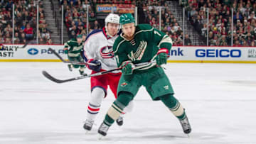 ST. PAUL, MN - DECEMBER 31: Chris Stewart #7 of the Minnesota Wild and Ryan Murray #27 of the Columbus Blue Jackets skate to the puck during the game on December 31, 2016 at the Xcel Energy Center in St. Paul, Minnesota. (Photo by Bruce Kluckhohn/NHLI via Getty Images)