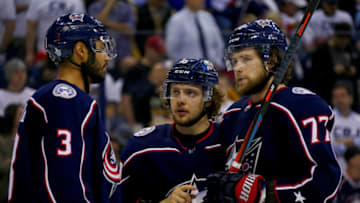 COLUMBUS, OH - MAY 6: Seth Jones #3, Artemi Panarin #9, and Josh Anderson #77 of the Columbus Blue Jackets discuss a play while playing against the Boston Bruins in Game Six of the Eastern Conference Second Round during the 2019 NHL Stanley Cup Playoffs on May 6, 2019 at Nationwide Arena in Columbus, Ohio. Boston defeated Columbus 3-0 to win the series 4-2. (Photo by Kirk Irwin/Getty Images)