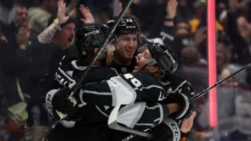 Mar 2, 2023; Los Angeles, California, USA; Los Angeles Kings left wing Alex Iafallo (19) celebrates with right wing Gabriel Vilardi (13) and center Blake Lizotte (46) after scoring a goal during the second period against the Montreal Canadiens at Crypto.com Arena. Mandatory Credit: Kiyoshi Mio-USA TODAY Sports