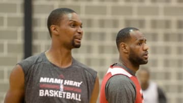 LeBron James, Chris Bosh (Photo credit should read ROBYN BECK/AFP via Getty Images)