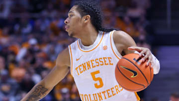 Jan 11, 2022; Knoxville, Tennessee, USA; Tennessee Volunteers guard Zakai Zeigler (5) moves the ball against the South Carolina Gamecocks during the second half at Thompson-Boling Arena. Mandatory Credit: Randy Sartin-USA TODAY Sports