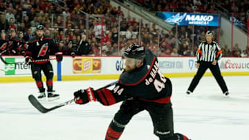 RALEIGH, NC - MAY 16: Calvin de Haan #44 shoots the puck in Game Four of the Eastern Conference Third Round against the Boston Bruins during the 2019 NHL Stanley Cup Playoffs on May 16, 2019 at PNC Arena in Raleigh, North Carolina. (Photo by Gregg Forwerck/NHLI via Getty Images)