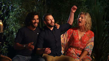 AUCKLAND, NEW ZEALAND - JULY 05: Avi (C) reacts as he wins Survivor NZ with Tom (L) and Barb (R) during the Survivor NZ Live Final at Civic Theatre on July 5, 2017 in Auckland, New Zealand. (Photo by Phil Walter/Getty Images for TVNZ)
