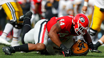 ATHENS, GA - NOVEMBER 06: Travon Walker #44 of the Georgia Bulldogs sacks Tyler Macon #10 of the Missouri Tigers in the second half at Sanford Stadium on November 6, 2021 in Athens, Georgia. (Photo by Todd Kirkland/Getty Images)