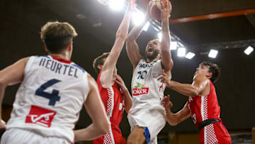 ORLEANS, FRANCE - AUGUST 08: Evan Fournier #10 of France is at the basket against Dragan Bender #15 and Dario Saric #9 of Croatia during the international friendly game between France v Croatia at Palais des Sports on August 8, 2017 in Orleans, France. (Photo by Catherine Steenkeste/Getty Images)