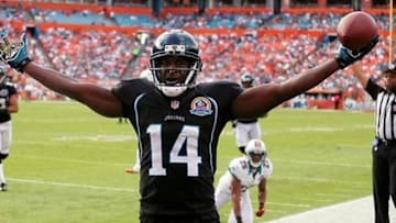 Dec 16, 2012; Miami Gardens, FL, USA; Jacksonville Jaguars wide receiver Justin Blackmon (14) celebrates a touchdown catch over Miami Dolphins defensive back R.J. Stanford (not pictured) but it was called back on a penalty in the second quarter at Sun Life Stadium. Mandatory Credit: Robert Mayer-USA TODAY Sports