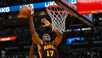Jan 14, 2022; Miami, Florida, USA; Atlanta Hawks forward Onyeka Okongwu (17) is fouled by Miami Heat center Dewayne Dedmon (21) during the fourth quarter of the game at FTX Arena. Mandatory Credit: Sam Navarro-USA TODAY Sports