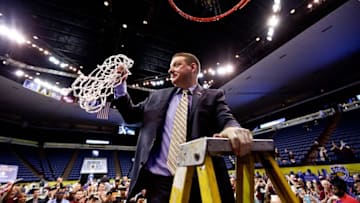 Mar 13, 2016; New Orleans, LA, USA; Arkansas Little Rock Trojans head coach Chris Beard celebrates by cutting down the net following a win against the Louisiana Monroe Warhawks in the Sun Belt Conference tournament championship game at the Lakefront Arena. Arkansas Little Rock defeated Louisiana Monroe 70-50. Mandatory Credit: Derick E. Hingle-USA TODAY Sports