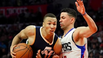 Oct 30, 2016; Los Angeles, CA, USA; Utah Jazz guard Dante Exum (11) drives to the basket defended by Los Angeles Clippers guard Austin Rivers (25) in the second half of the game at Staples Center. Clippers won 88-75. Mandatory Credit: Jayne Kamin-Oncea-USA TODAY Sports