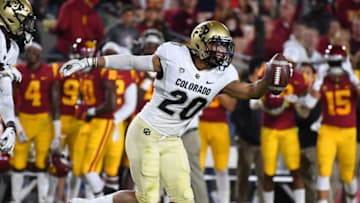 Oct 13, 2018; Los Angeles, CA, USA; Colorado Buffaloes linebacker Drew Lewis (20) celebrates after intercepting a ball on the first pass of the game by USC Trojans quarterback JT Daniels (18) (not pictured) in the first quarter at The Los Angeles Memorial Coliseum. Mandatory Credit: Jayne Kamin-Oncea-USA TODAY Sports