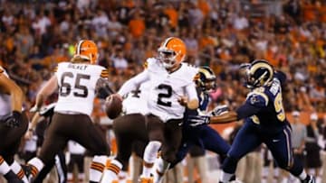 Aug 23, 2014; Cleveland, OH, USA; Cleveland Browns quarterback Johnny Manziel (2) runs the ball for a touchdown in the third quarter against the St. Louis Rams at FirstEnergy Stadium. Mandatory Credit: Rick Osentoski-USA TODAY Sports