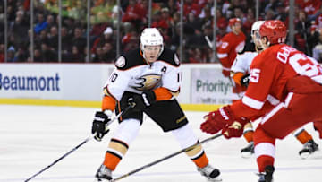 Jan 23, 2016; Detroit, MI, USA; Anaheim Ducks right wing Corey Perry (10) takes the puck up ice during the third period against the Detroit Red Wings at Joe Louis Arena. Anaheim won 4-3. Mandatory Credit: Tim Fuller-USA TODAY Sports