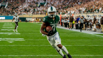 EAST LANSING, MI - SEPTEMBER 02: Keon Coleman #0 of the Michigan State Spartans scores a touchdown in the first half against Western Michigan at Spartan Stadium on September 2, 2022 in East Lansing, Michigan. (Photo by Jaime Crawford/Getty Images)