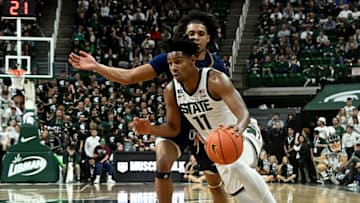Nov 7, 2022; East Lansing, Michigan, USA; Michigan State Spartans guard A.J. Hoggard (11) drives the ball to the basket against the Northern Arizona Lumberjacks in the second half at Jack Breslin Student Events Center. Mandatory Credit: Dale Young-USA TODAY Sports