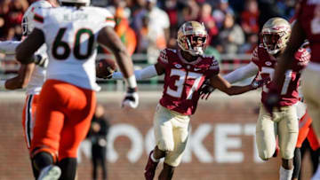 Florida State Seminoles defensive back Omarion Cooper (37 celebrates an interception. The Florida State Seminoles lead the Miami Hurricanes 20-7 at the half Saturday, Nov. 13, 2021.Fsu V Miami263