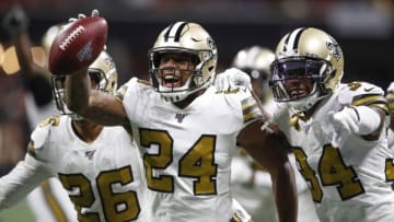 ATLANTA, GA - NOVEMBER 28: Vonn Bell #24 of the New Orleans Saints reacts after recovering a fumble along with teammates P.J. Williams #26 and Justin Hardee #34 during the second half of an NFL game against the Atlanta Falcons at Mercedes-Benz Stadium on November 28, 2019 in Atlanta, Georgia. (Photo by Todd Kirkland/Getty Images)