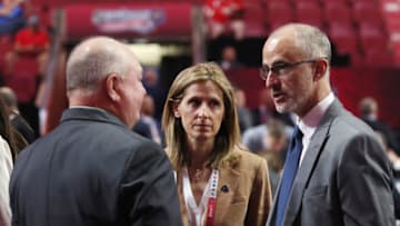 MONTREAL, QUEBEC - JULY 08: (L-R) Bruce Boudreau and Cammi Granato of the Vancouver Canuks speak with Don Granato of the Buffalo Sabres at the 2022 NHL Draft at the Bell Centre on July 08, 2022 in Montreal, Quebec. (Photo by Bruce Bennett/Getty Images)