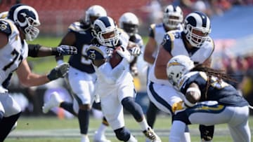 LOS ANGELES, CA - SEPTEMBER 23: Todd Gurley #30 of the Los Angeles Rams carries the ball in the first quarter of the game against the Los Angeles Chargers at Los Angeles Memorial Coliseum on September 23, 2018 in Los Angeles, California. (Photo by Harry How/Getty Images)
