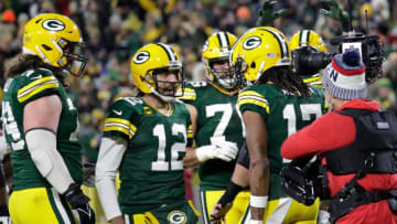Green Bay Packers quarterback Aaron Rodgers (12) celebrates with wide receiver Davante Adams (17) after Adams scored a touchdown against the Chicago Bears in the fourth quarter during their football game Sunday, December 12, 2021, at Lambeau Field in Green Bay, Wis. Dan Powers/USA TODAY NETWORK-WisconsinApc Packvsbears 1212211903djp