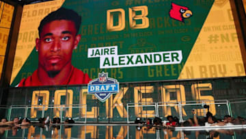 ARLINGTON, TX - APRIL 26: A video board displays an image of Jaire Alexander of Louisville after he was picked #18 overall by the Green Bay Packers during the first round of the 2018 NFL Draft at AT&T Stadium on April 26, 2018 in Arlington, Texas. (Photo by Tom Pennington/Getty Images)