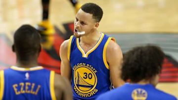 May 9, 2016; Portland, OR, USA; Golden State Warriors guard Stephen Curry (30) celebrates with teammates after in the closing seconds of a 132-125 win in overtime against the Portland Trail Blazers in game four of the second round of the NBA Playoffs at Moda Center at the Rose Quarter. Mandatory Credit: Jaime Valdez-USA TODAY Sports