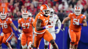 Dec 31, 2016; Glendale, AZ, USA; Clemson wide receiver Mike Williams (7) runs the ball after a catch against the Ohio State Buckeyes during the first quarter in the 2016 CFP semifinal at University of Phoenix Stadium. Mandatory Credit: Matt Kartozian-USA TODAY Sports