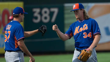 Jul 16, 2016; Philadelphia, PA, USA; New York Mets starting pitcher Noah Syndergaard (34) and relief pitcher Seth Lugo (67) prior to game at Citizens Bank Park. Mandatory Credit: Bill Streicher-USA TODAY Sports