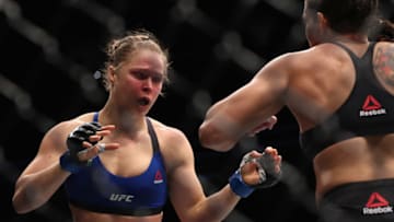 LAS VEGAS, NV - DECEMBER 30: (L-R) Ronda Rousey and Amanda Nunes of Brazil face off in their UFC women's bantamweight championship bout during the UFC 207 event at T-Mobile Arena on December 30, 2016 in Las Vegas, Nevada. (Photo by Christian Petersen/Getty Images)