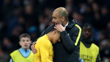 MANCHESTER, ENGLAND - DECEMBER 18: Alexis Sanchez of Arsenal (L) and Josep Guardiola, Manager of Manchester City (R) embrace after the final whistle during the Premier League match between Manchester City and Arsenal at the Etihad Stadium on December 18, 2016 in Manchester, England. (Photo by Clive Brunskill/Getty Images)